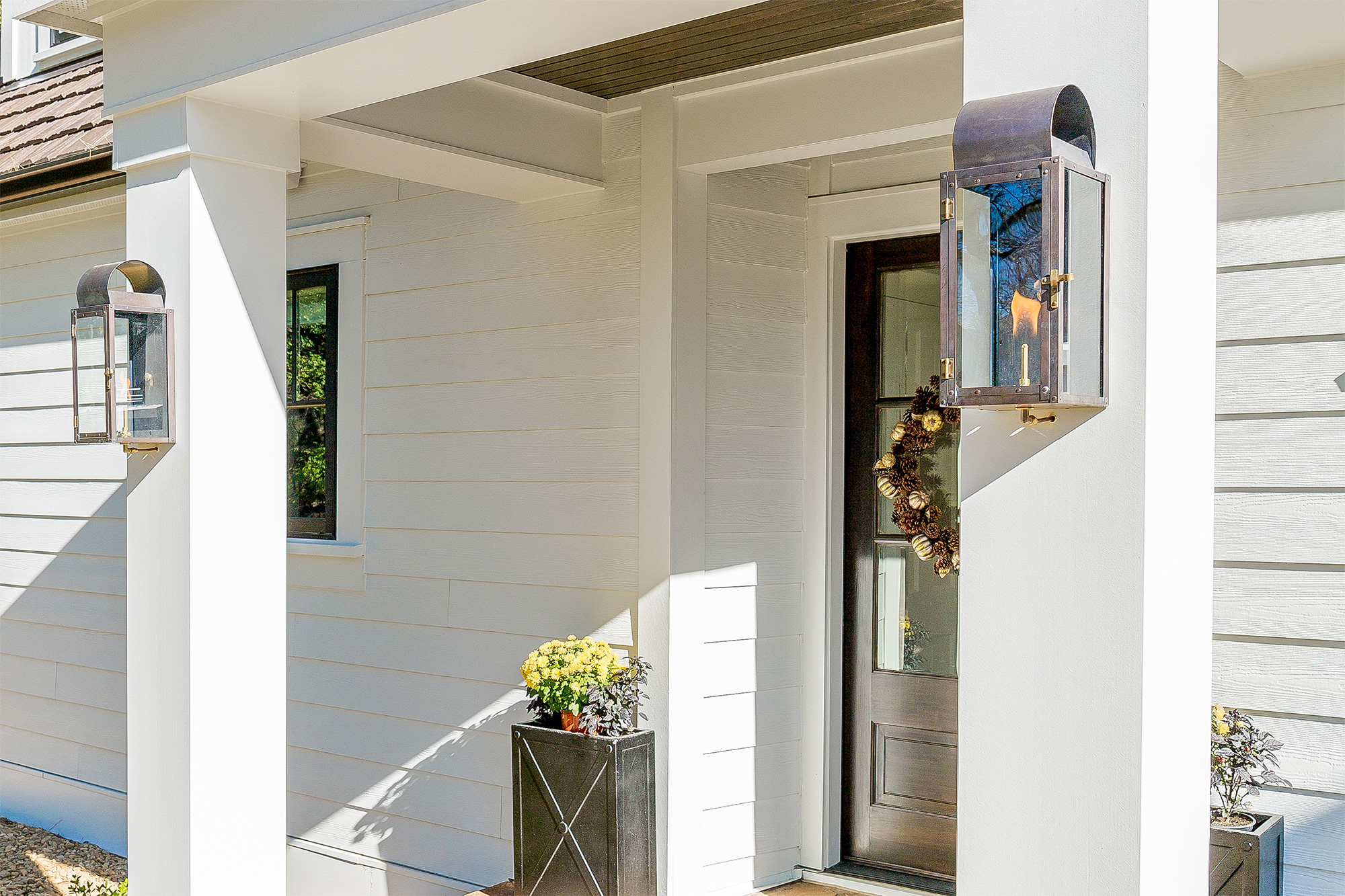 house with outdoor wall lamp